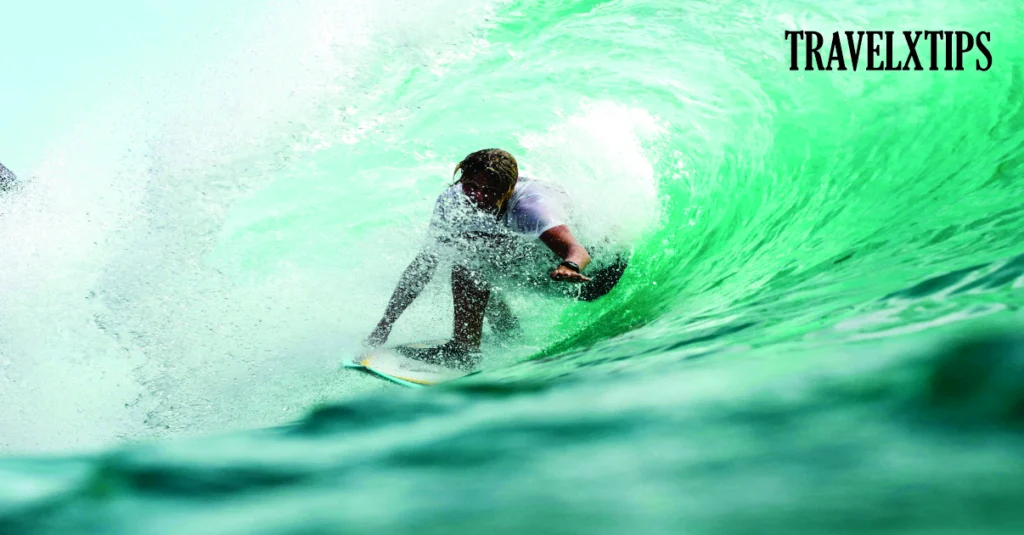 a man surfing a round wave